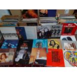 A quantity of LP'S and records to include Barry White, Diana Ross, Michael Jackson and Belinda