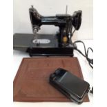 A 1950's Singer 222K featherweight free-arm sewing machine in original case Location:RWB