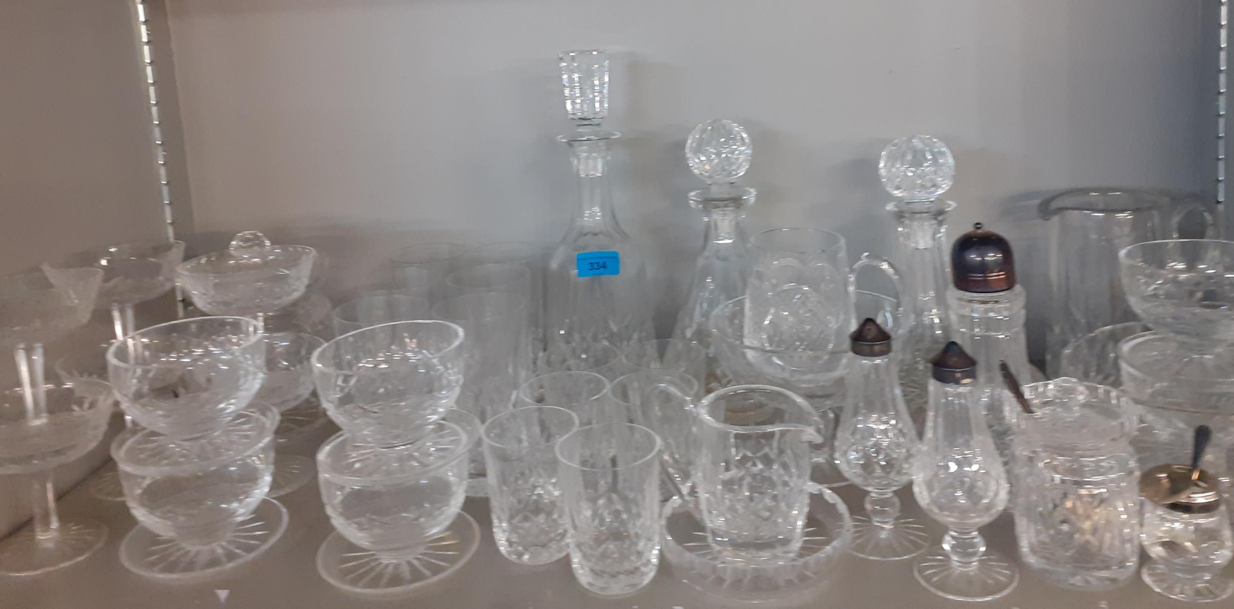 Cut glass to include three decanters, hi-ball glasses and a sugar sifter Location: 2:2