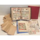 A quantity of postage stamps from around the world to include an 1840 Penny Black, Penny Reds and