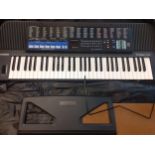 A Casio Tone Bank CT-670 keyboard in a padded travel bag with folding Casio stand Location: RWF