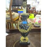 A 20th century green onyx and gilt metal table lamp in the form of an urn with ram mask and swag