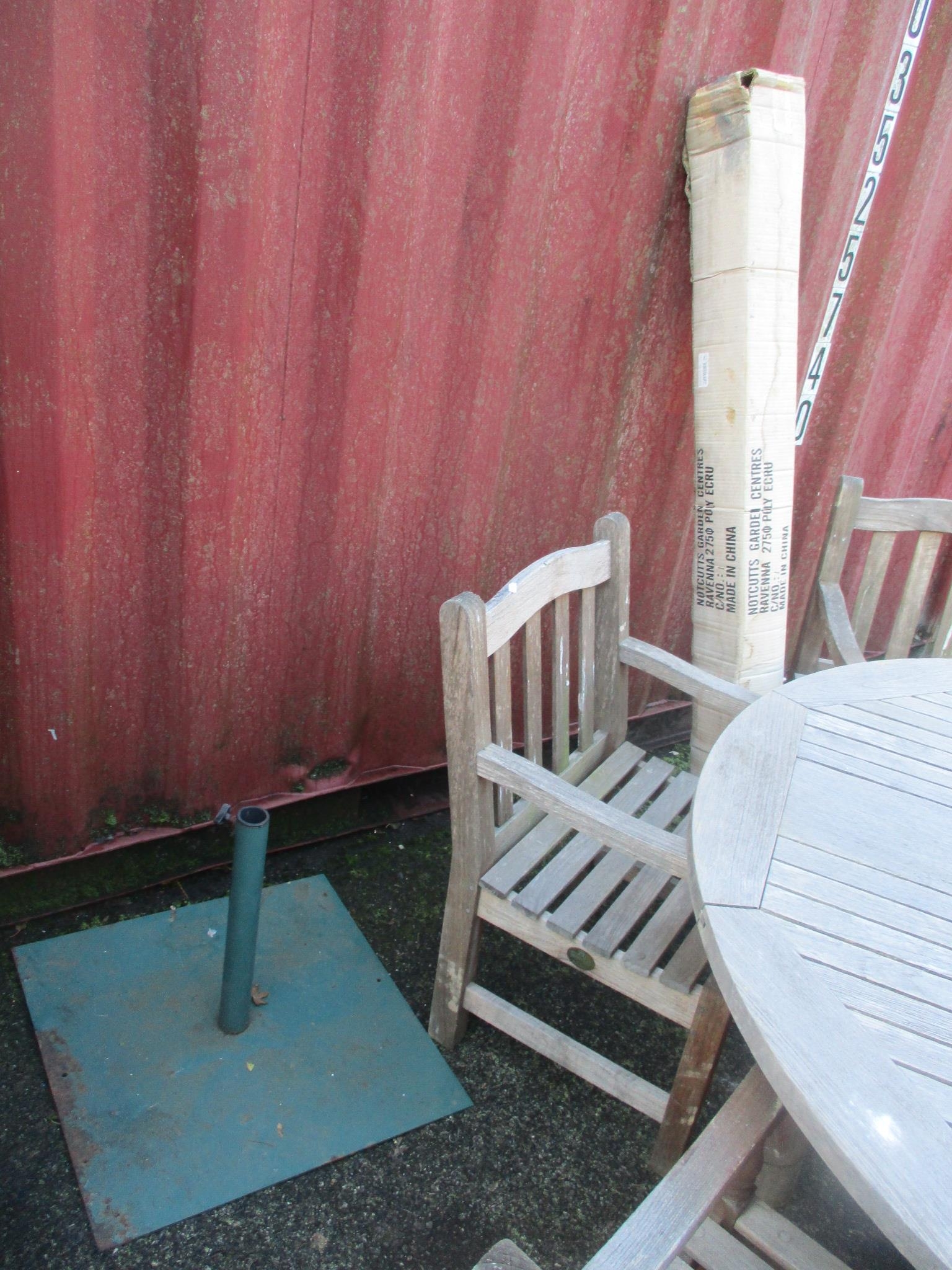 A Barlow Tyrie teak garden table, 69.5cm h x 149cm w and six matching chairs together with a Parasol - Image 3 of 3