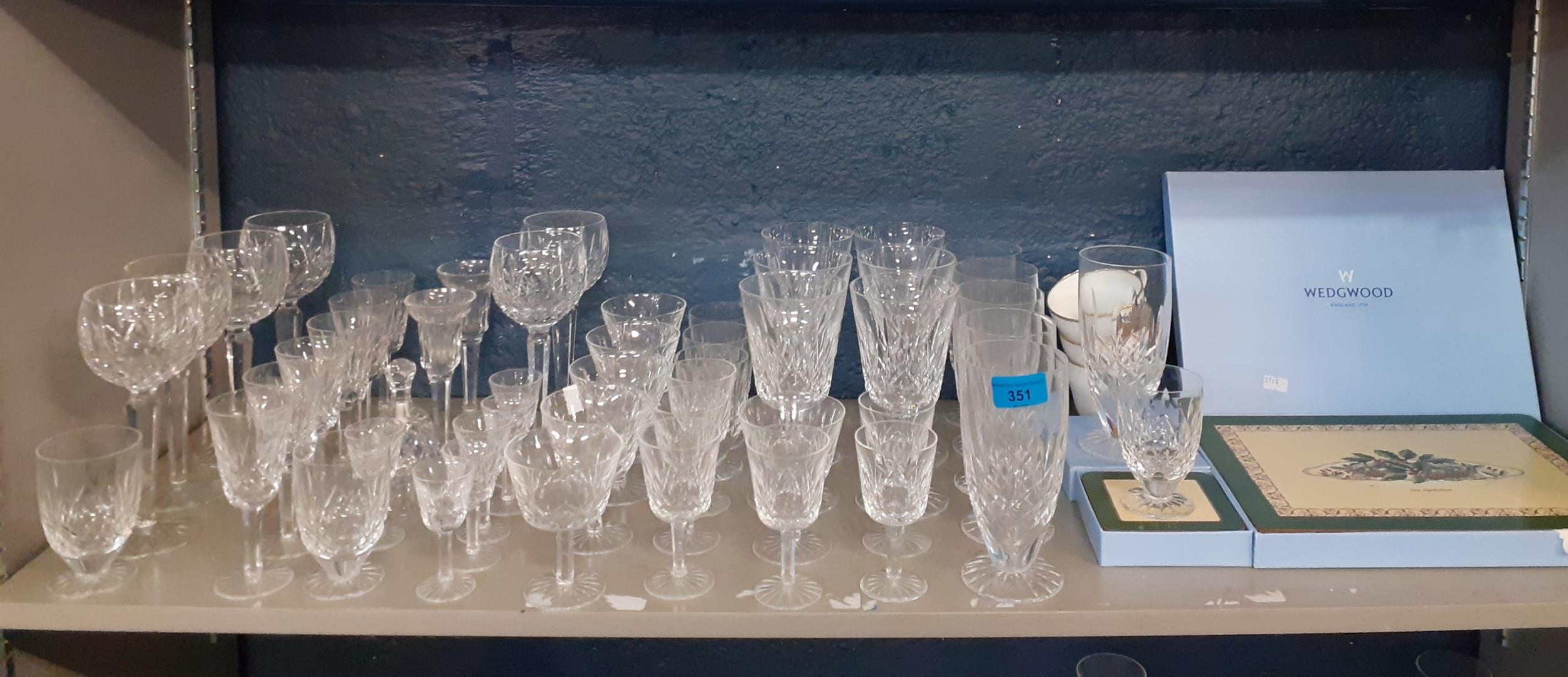 A suite of Waterford Lismore crystal glasses to include six large white wine pedestal glasses, six