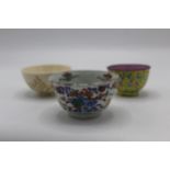 Three Oriental tea bowls to include an 18th century Chinese Wucai example decorated with yellow