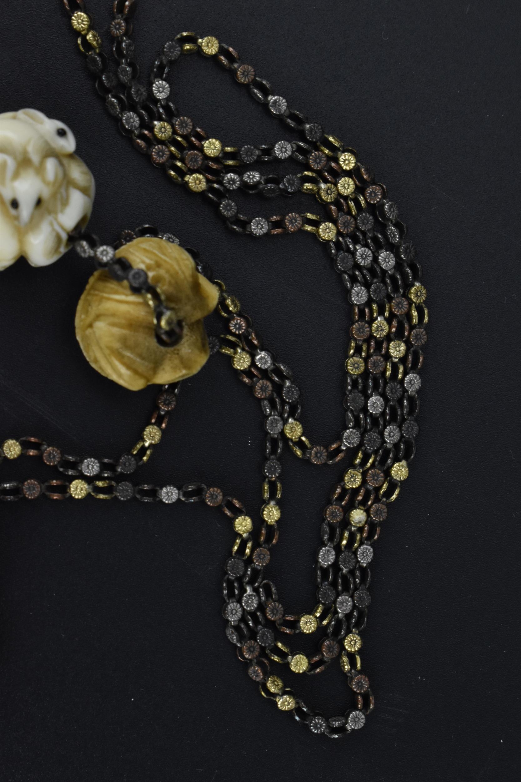A 19th century Japanese ojime bead necklace, with carved ivory, bone, and metal ojimes, modelled - Bild 7 aus 7