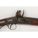 An early 19th century East India Company Flintlock rifle having an octagonal barrel at breech with