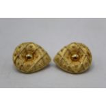 A pair of 18ct gold earrings with a rope twist design and inset roundels, signed 'J Yanes' for Jesvs