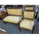 A reproduction Regency style mahogany two seater carved sofa and two matching armchairs Location: