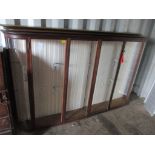 A 19th century mahogany top-half glazed bookcase with two loose shelves 127cm h x 206.5cm w