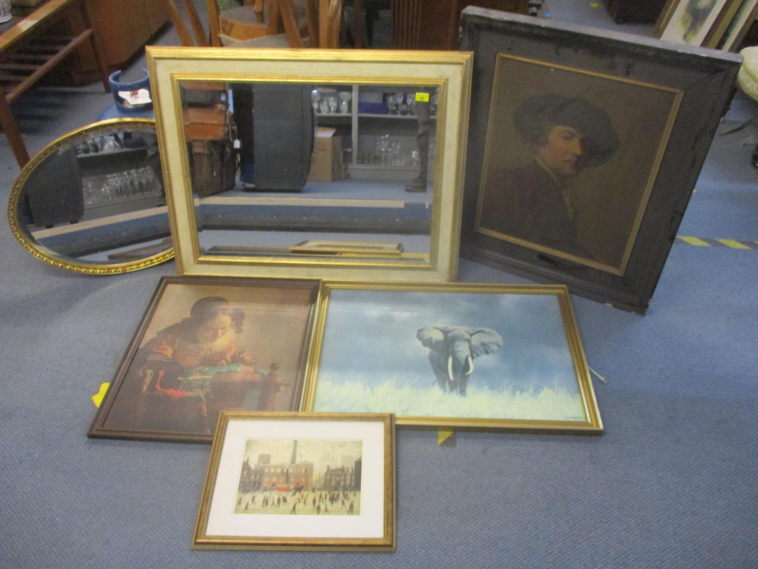 A gilt framed rectangular wall mirror and an oval gilt framed wall mirror, along with various framed