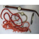 A lades Betima 9ct gold cased wristwatch, another ladies wristwatch, two coral necklaces and a