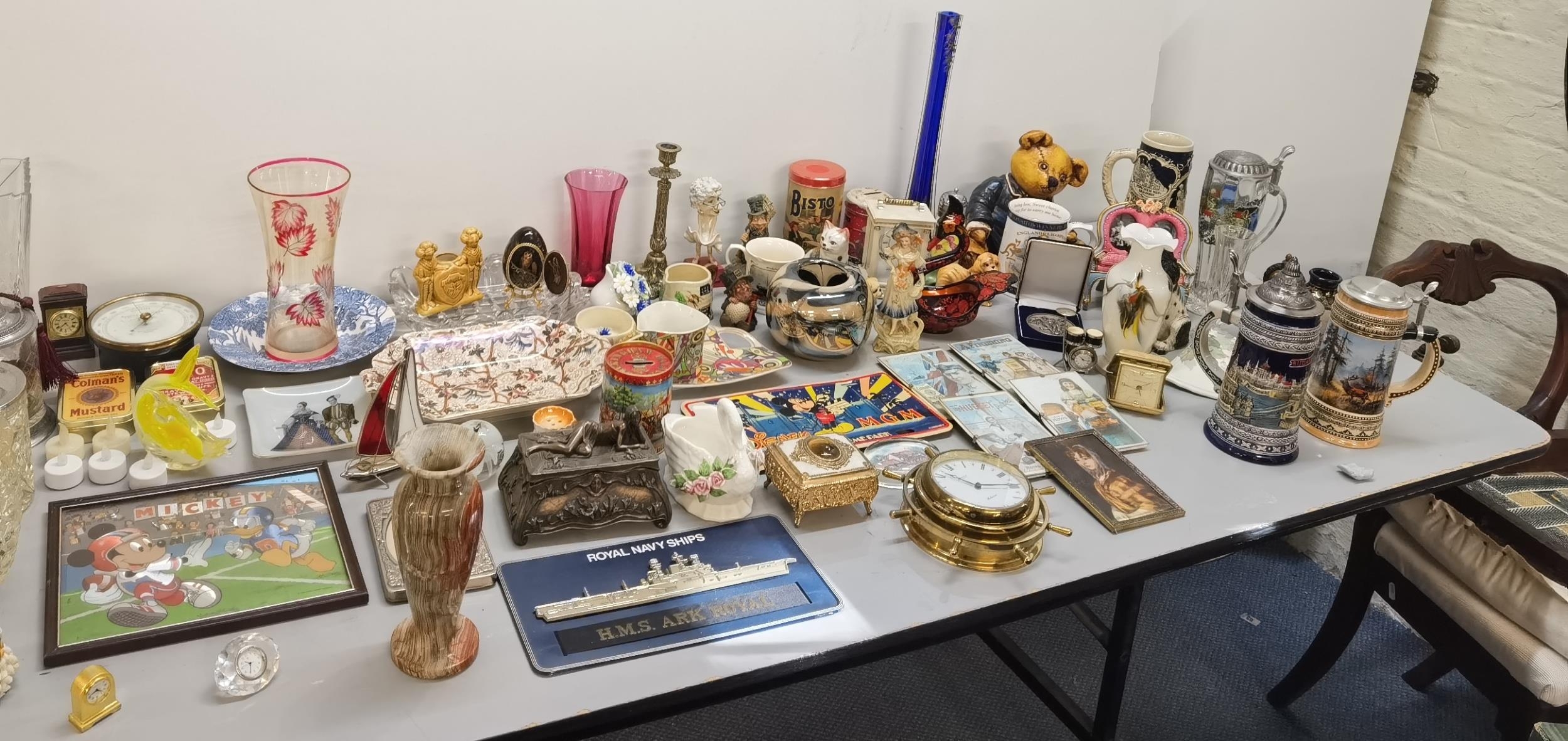A mixed lot of collectables to include ceramics and glassware, Steins wall art, cups and dishes