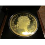A cased and boxed Military Guinea Golden Commemorative by the London Mint Office, 88mm diameter,