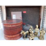A Chinese red lacquered food storage box with internal compartments together with an Oriental carved