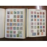 Two Simplex stamp albums containing Victorian and early 20th century stamps from around the world to