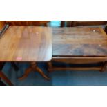 A hardwood drop flap coffee table on turned legs and shaped stretchers, 91cm x 61cm x 46.5cmh, and a