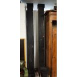A set of four 20th century black painted fluted pilasters 264cm h x 20cm w
