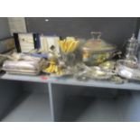 A selection of silver plated items to include serving tureens, cased sets of spoons, knives and a