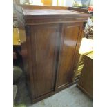 A Victorian mahogany two door side cabinet fitted with shelves and on a plinth base, 155cm h x 91.