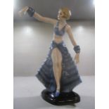A Fasold & Stauch Bock, Wallendorf Art Deco figurine of a young woman in a dress in typical pose,