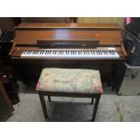A Kimball upright piano 94cm h x 146cm w, together with a piano stool Location: G