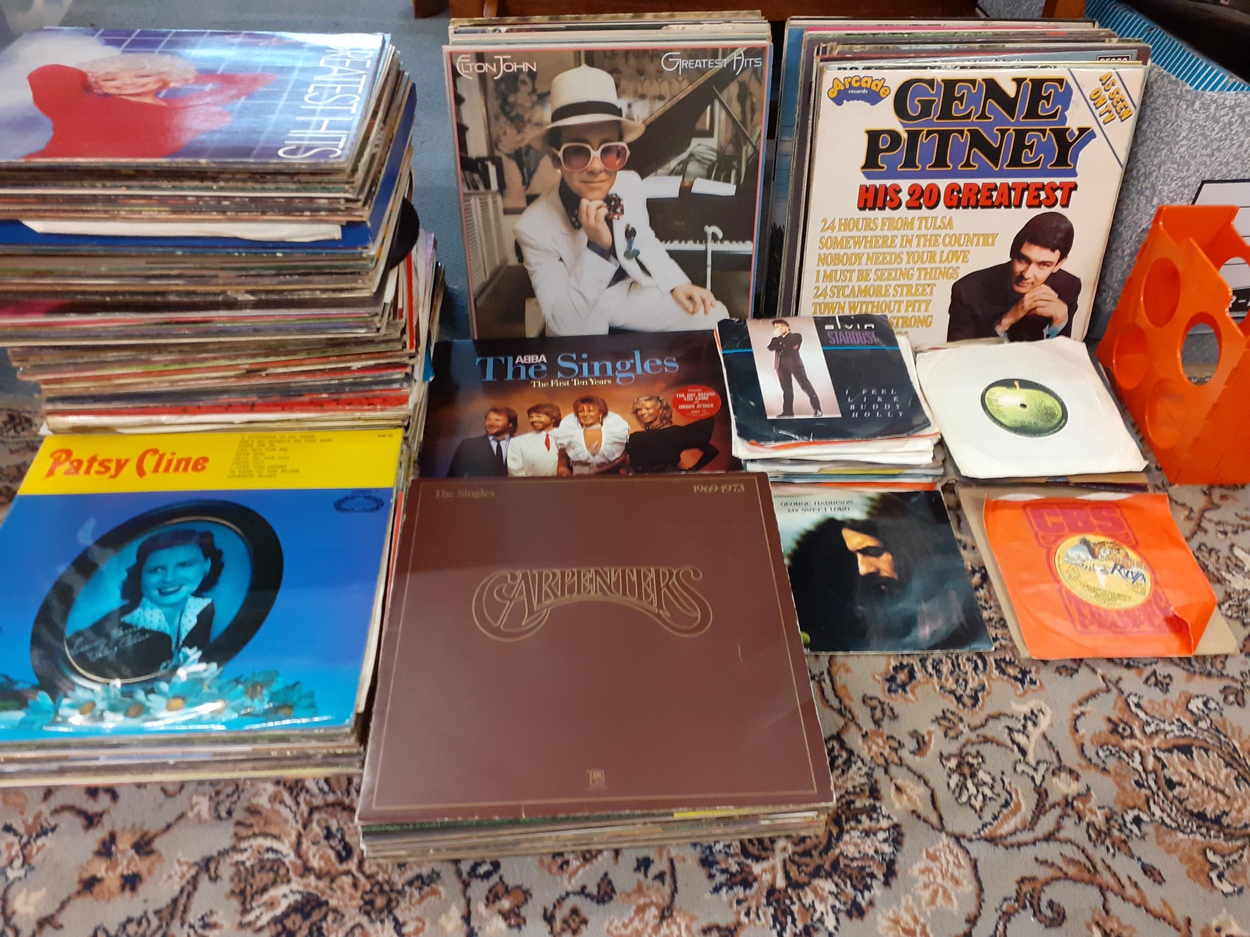 A large quantity of records to include mainly 1970's artists, country and western, Patsy Cline,