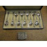 Continental silver comprising eleven Dutch teaspoons with windmill handles, and a box embossed