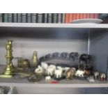 A mixed lot of brass and Indian and Asian ornaments to include an ebony and bone elephant train,