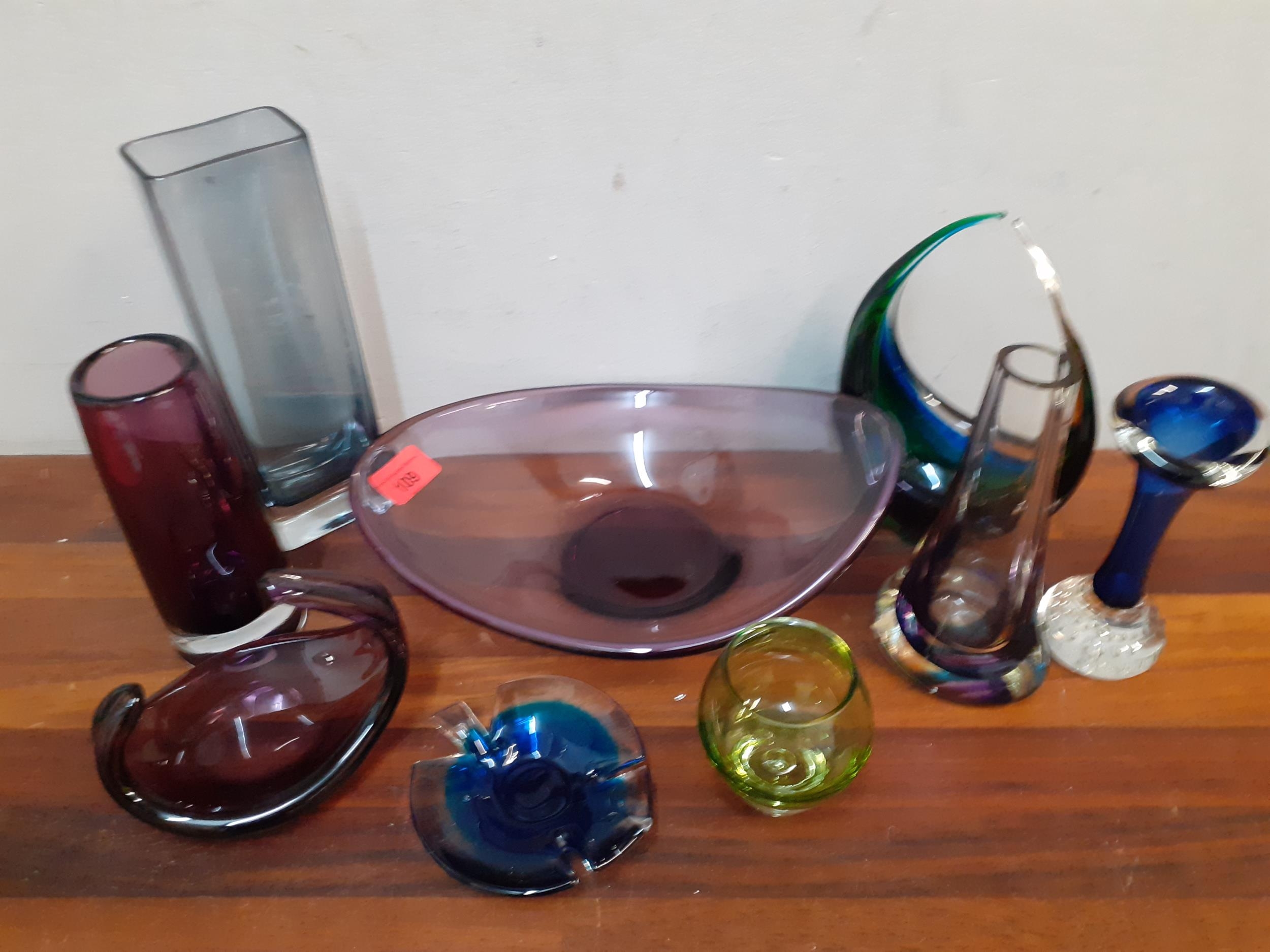 Art glass to include coloured vases, dishes, a basket, tea light and other items Location: