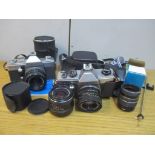 Photographic equipment to include a Praktica MTL3, and a Super TL1000 camera, lenses and accessories