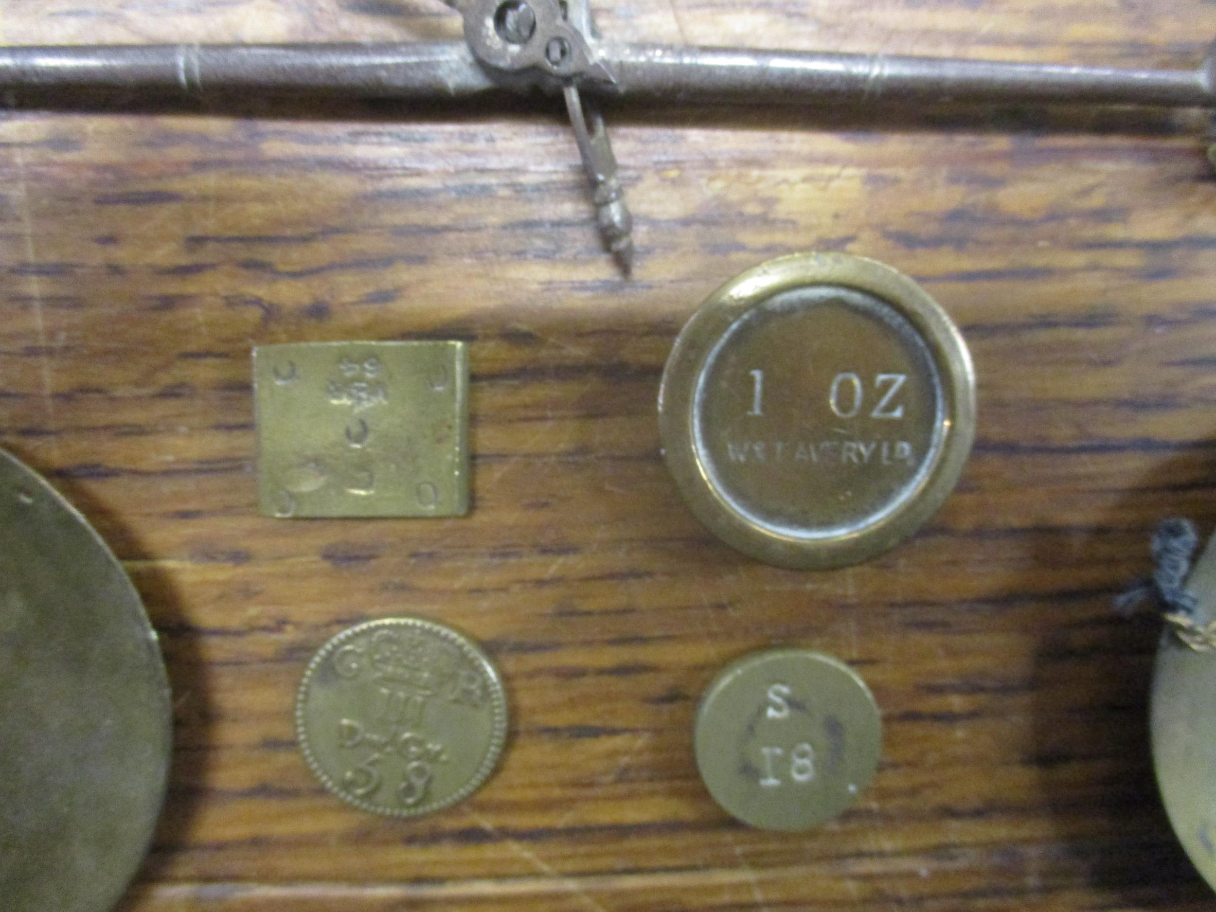 A wooden cased brass goldsmiths scales with various weights to include a George III 5:8 guinea - Image 2 of 2