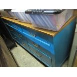 A modern blue painted sideboard with nine inset drawers together with a matching chest of drawers