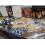 Seventeen Beatles and related albums, records to include The White Album Location: