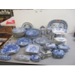 A quantity of early 19th century and later blue and white ceramics to include a warming dish,