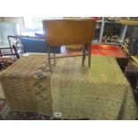 An Edwardian Sutherland table together with two rugs to include a Pakistan rug with multiguard