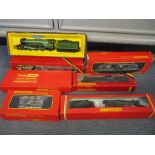 A collection of boxed 00 gauge locomotives to include a Hornby R065 Evening Star