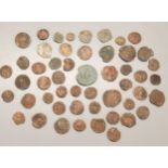 A collection of small Roman Republic and Roman Empire bronze coins together with other possibly