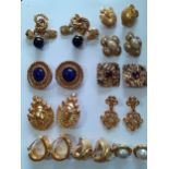 Two pairs of Guy Laroche gold tone earrings to include a circular pair with blue Lapis Lazula