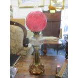 A Victorian copper and brass James Kinks & Sons Duplex oil lamp base with cut glass reservoir, the