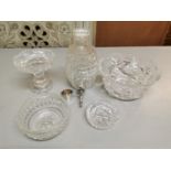 A small collection of cut glass and crystal bowls, together with a cut glass liqueur decanter in the