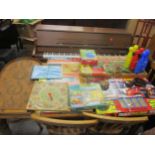 A selection of vintage games and toys to include a wooden bagatelle game, two boxed Plastic
