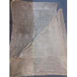 A 1920's Art Deco Egyptian Assyut shawl with nickel silver decoration on a cream mesh ground