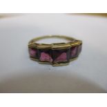 A 9ct gold five stone amethyst set ring, 2.7g Location: Cab