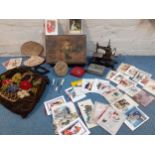 A vintage lot comprising a Fairylite tabletop miniature sewing machine A/F, together with a small