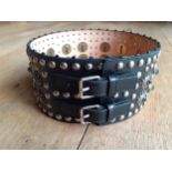 Alexander McQueen-A black embellished double buckle leather belt, heavily studded with the