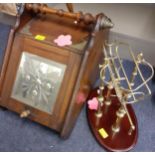 A mahogany coal scuttle with mirrored front panel, shovel and contemporary novelty wine bottle