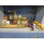 A mixed lot of kitchenalia to include stoneware jugs and bottles, a French wickerwork baguette