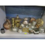 A lot of mixed metalware to include copper kettles, pewter ware, brass candlestick, vintage tins and