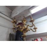 A pair of mid 20th century brass five arm ceiling lights Location: SLceiling